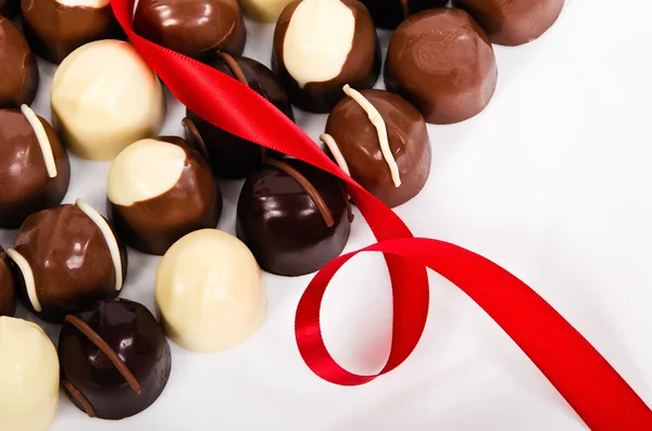 Assortment of dark and white chocolate candies — Stock Photo, Image