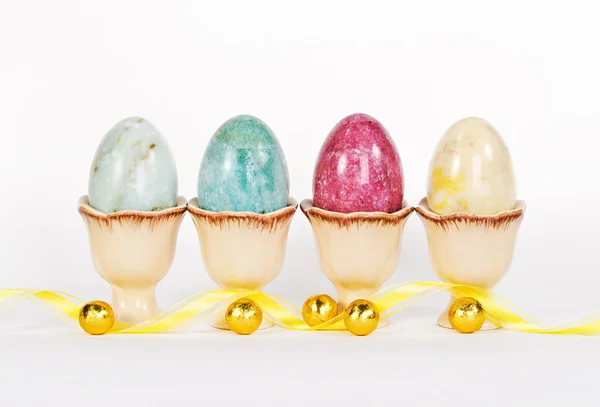 Marble Easter eggs in egg cups — Stock Photo, Image