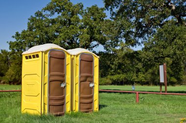 Yellow portable toilets clipart