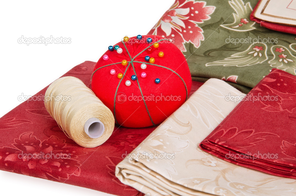 Quilting fabrics with thread and pin cushion