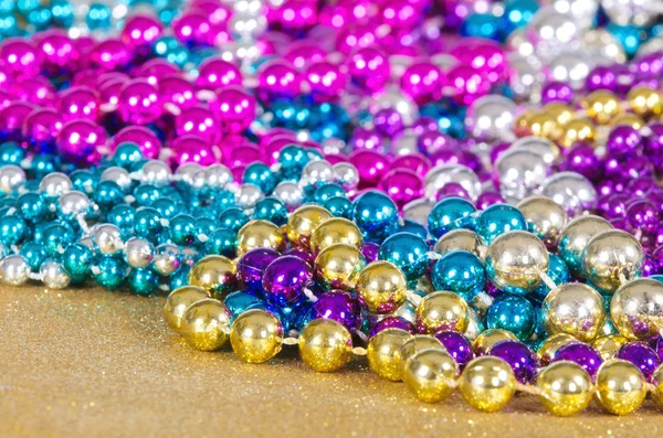 Colorful Mardi Gras beads — Stock Photo, Image