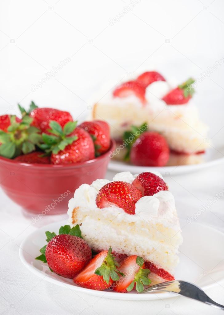 Slice of homemade strawberry cream cake