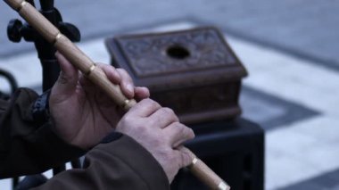 Man Playing Turkish Traditional Music Instrument Flute. Named Ney Playing Sufi Music