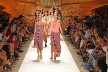 MIAMI - JULY 20: Designers Catalina Álvarez and Mariana Hinestroza walks runway with models at the Agua Bendita Collection for Spring Summer 2013 during Mercedes-Benz Swim Fashion Week on July 20, 201