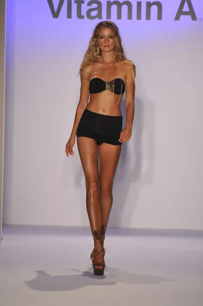 MIAMI - JULY 20: Model walks runway at the Vitamin A Swim Collection for Spring Summer 2013 during Mercedes-Benz Swim Fashion Week on July 20, 2012 in Miami, FL — Stock Photo, Image