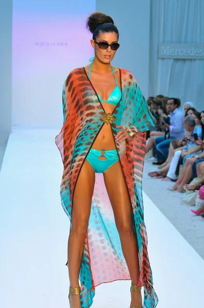 MIAMI - JULY 21: Model walks runway at the Agua di Lara Swim Collection for Spring Summer 2013 during Mercedes-Benz Swim Fashion Week on July 21, 2012 in Miami, FL — Stock Photo, Image