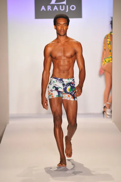 MIAMI - JULY 20: Model walks runway at the A.Z Araujo Swim Collection for Spring Summer 2013 during Mercedes-Benz Swim Fashion Week on July 20, 2012 in Miami, FL — Stock Photo, Image