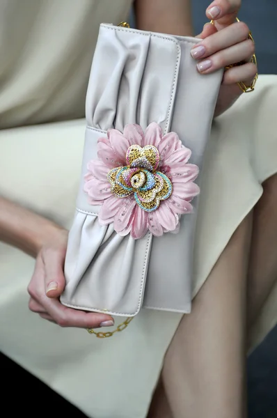 Model holding couture designer purse — Stock Photo, Image