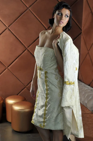 Model wearing couture designer gown in restaurant — Stock Photo, Image