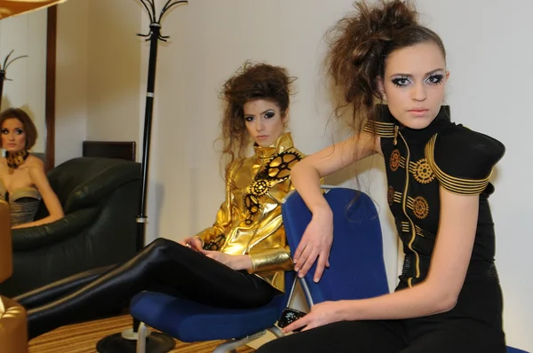 MOSCOW - MARCH 21: A Models get ready backstage for Sabina Gorelik Fall Winter 2012 presentation in WTC during Mercedes-Benz Fashion Week on March 21, 2012 in Moscow — Stock Photo, Image