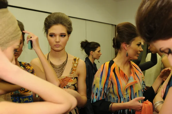 MOSCOW - MARCH 23: A model gets ready backstage at the RUSIKO for Fall Winter 2012 presentation during MBFW on March 23, 2012 in Moscow, Russia — Stock Photo, Image