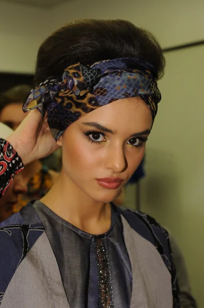 MOSCOW - MARCH 23: A model gets ready backstage at the RUSIKO for Fall Winter 2012 presentation during MBFW on March 23, 2012 in Moscow, Russia — Stock Photo, Image