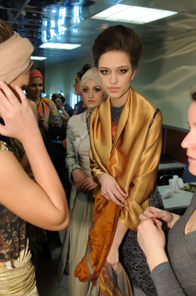 MOSCOW - MARCH 23: A model gets ready backstage at the RUSIKO for Fall Winter 2012 presentation during MBFW on March 23, 2012 in Moscow, Russia — Stock Photo, Image