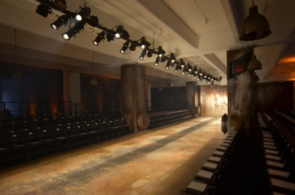 Empty fashion show stage with runway, chairs and lights. — Stock Photo, Image
