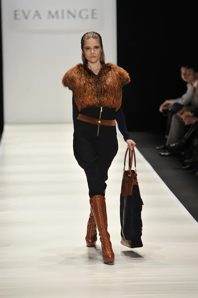 MOSCOW - MARCH 21: A Model walks runway at the Eva Minge for Fall Winter 2012 presentation during MBFW on March 21, 2012 in Moscow, Russia Stock Picture