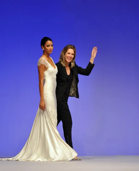 NEW YORK- OCTOBER 14: Model and designer walks runway for Sarah Janks Spotlight on Couture bridal show for Fall 2013 during NY Bridal Fashion Week on October 14, 2012 in New York City, NY — Stock Photo, Image