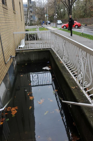 CleanMe záplavy v budovách, v okolí sheapsheadbay kvůli dopadu od hurricane písečná — Stock fotografie