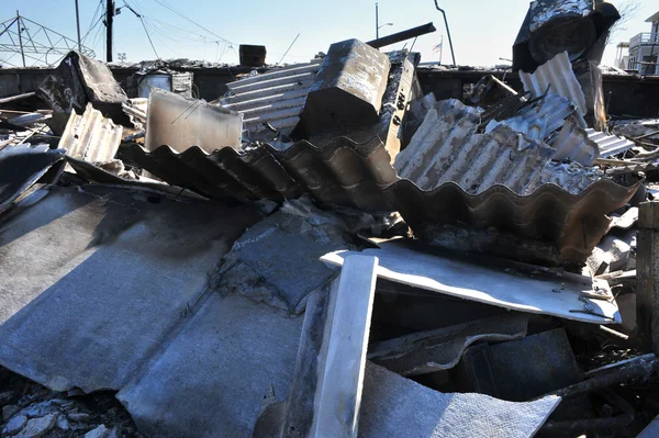 NEW YORK, NY - NOVEMBER 09: Scenes of Hurricane Sandy's aftermath in the Breezy Point part of Far Rockawayon November 9, 2012 in the Queens borough of New York City. — Stock Photo, Image