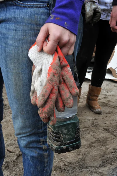 Queens, ny - 11 november: volontärer rengöring sand i rockaway beach bostadsområde efter orkanen sandstranden i queens, new york, USA, den 11 november, 2012. — Stockfoto