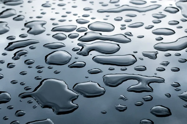 Drops of water on the metal surface — Stock Photo, Image