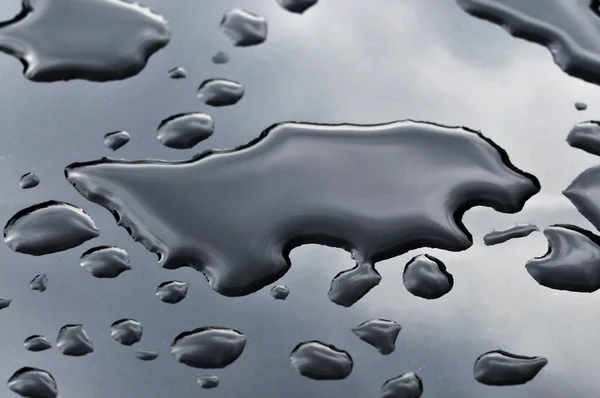 Drops of water on the metal surface — Stock Photo, Image