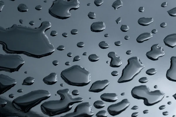 Drops of water on the metal surface — Stock Photo, Image