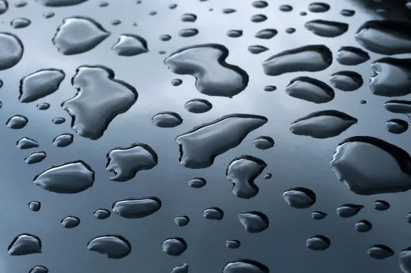 Drops of water on the metal surface — Stock Photo, Image