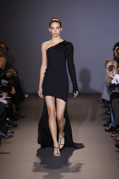 PARIS, FRANCE - MARCH 6: A model walks the runway during the Andrew GN Ready to Wear Autumn Winter 2011 2012 show during Paris Fashion Week on March 6, 2011 in Paris, France — Stock Photo, Image