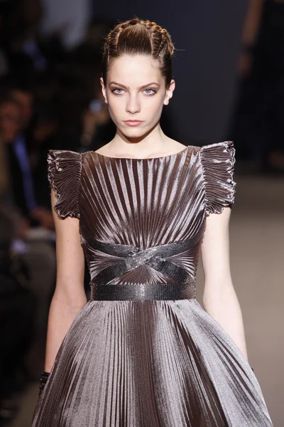 PARIS, FRANCE - MARCH 6: A model walks the runway during the Andrew GN Ready to Wear Autumn Winter 2011 2012 show during Paris Fashion Week on March 6, 2011 in Paris, France — Stock Photo, Image