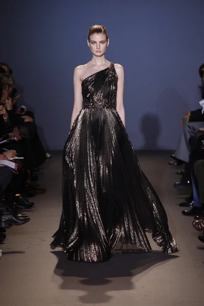 PARIS, FRANCE - MARCH 6: A model walks the runway during the Andrew GN Ready to Wear Autumn Winter 2011 2012 show during Paris Fashion Week on March 6, 2011 in Paris, France — Stock Photo, Image