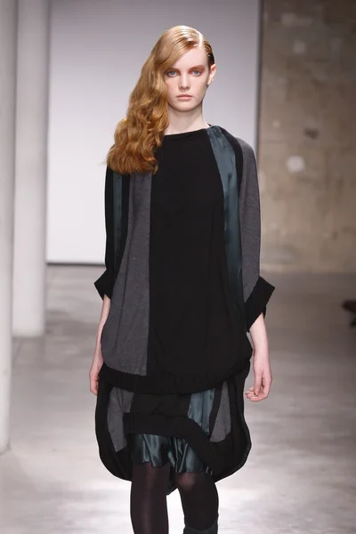 PARIS, FRANCE - FEBRUARY 29: A model walks the runway during the Atsuro Tayama Ready to Wear Fall Winter 2011 show as part of the Paris Fashion Week on February 29, 2012 in Paris, France — Stock Photo, Image