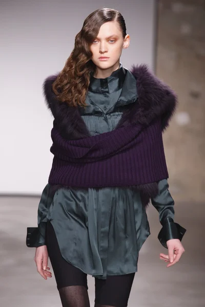 PARIS, FRANCE - FEBRUARY 29: A model walks the runway during the Atsuro Tayama Ready to Wear Fall Winter 2011 show as part of the Paris Fashion Week on February 29, 2012 in Paris, France — Stock Photo, Image