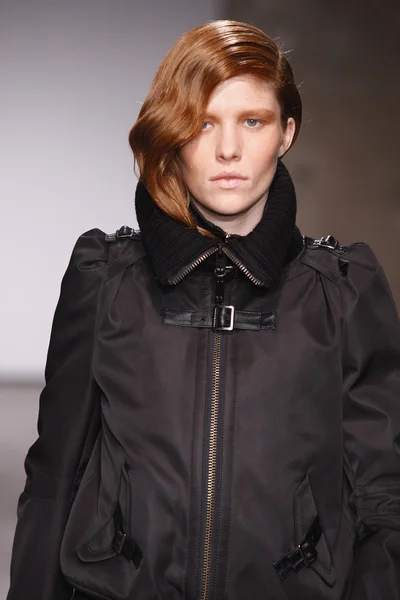 PARIS, FRANCE - FEBRUARY 29: A model walks the runway during the Atsuro Tayama Ready to Wear Fall Winter 2011 show as part of the Paris Fashion Week on February 29, 2012 in Paris, France — Stock Photo, Image