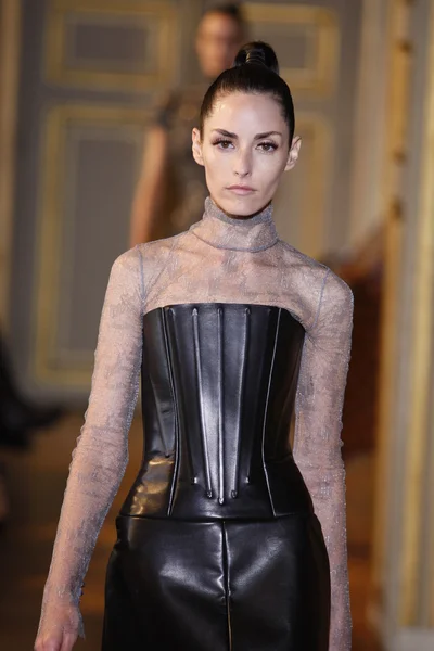 PARIS - MARCH 08: A model walks the runway during the Emmanuel Ungaro Ready to Wear show as part of the Paris Womenswear Fashion Week Fall Winter 2011 at Hotel Westin on March 8, 2010 in Paris, France — Stock Photo, Image