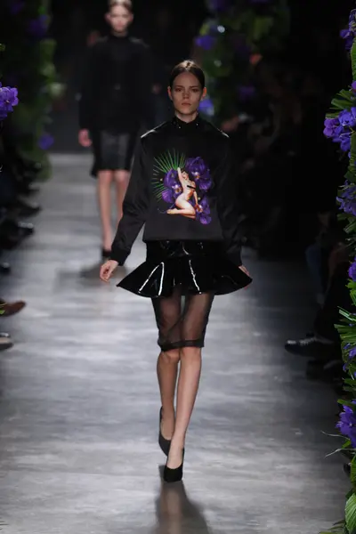 PARIS, FRANCE - MARCH 06: A model walks the runway at the Givenchy fashion show during Paris Fashion Week on March 6, 2011 in Paris, France. — Stock Photo, Image
