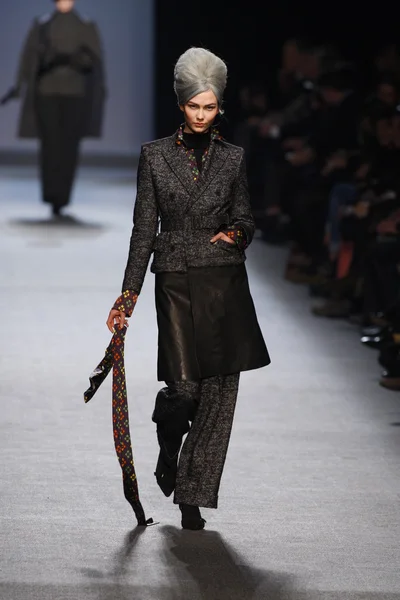 PARIS, FRANCE - MARCH 05: A model walks the runway at the Jean Paul Gaultier fashion show during Paris Fashion Week on March 5, 2011 in Paris, France. — Stock Photo, Image