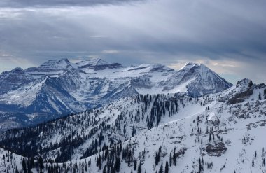 Spectacular view to the Mountains from summit of Alta ski resort in Utah clipart