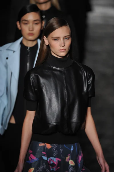 NEW YORK, NY - SEPTEMBER 11: A model walks the runway during the Diesel Black Gold show during Spring 2013 Mercedes-Benz Fashion Week at Pier 57 on September 11, 2012 in New York City. — Stock Photo, Image