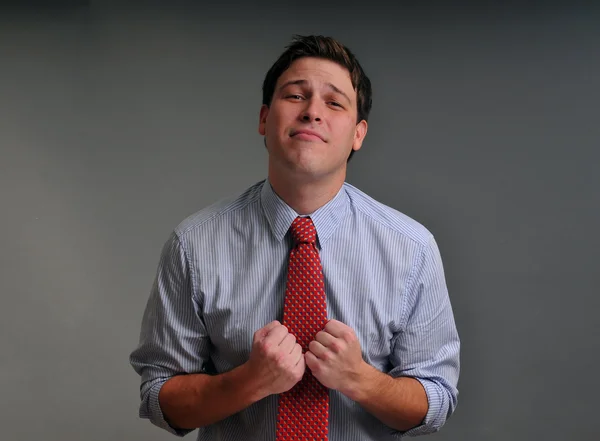 Young male actor making emotional facial expression in front of camera — Stock Photo, Image