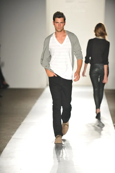 A model walks the runway at the DL 1961 Premium Denim spring 2013 fashion show Stock Photo