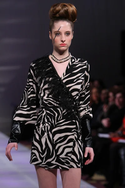 NEW YORK - FEBRUARY 17: A model walks runway for Tyrell Mason collection at New Yorker Hotel during Couture Fashion Week on February 17, 2013 in New York City — Stock Photo, Image