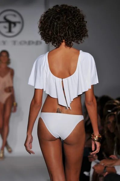 MIAMI - JULY 16: Model walks runway at the Shay Todd Swimsuit Collection for Spring, Summer 2012 during Mercedes-Benz Swim Fashion Week on July 16, 2011 in Miami, FL — Stock Photo, Image