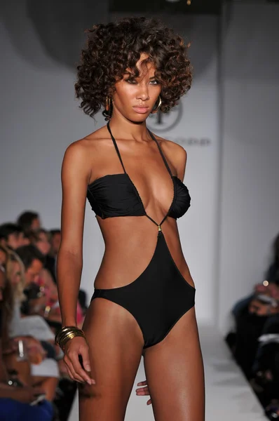 MIAMI - JULY 16: Model walks runway at the Shay Todd Swimsuit Collection for Spring, Summer 2012 during Mercedes-Benz Swim Fashion Week on July 16, 2011 in Miami, FL — Stock Photo, Image