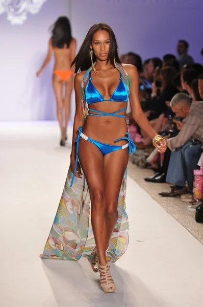 MIAMI - JULY 18: Model walking runway at the Have Faith Collection for Spring, Summer 2012 during Mercedes-Benz Swim Fashion Week on July 18, 2011 in Miami, FL — Stock Photo, Image