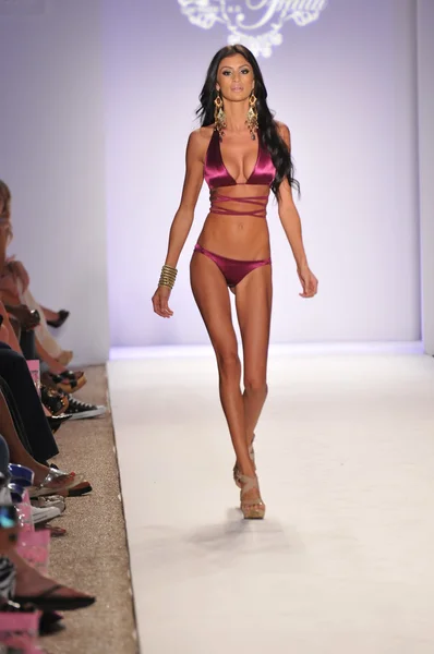 MIAMI - JULY 18: Model walking runway at the Have Faith Collection for Spring, Summer 2012 during Mercedes-Benz Swim Fashion Week on July 18, 2011 in Miami, FL — Stock Photo, Image