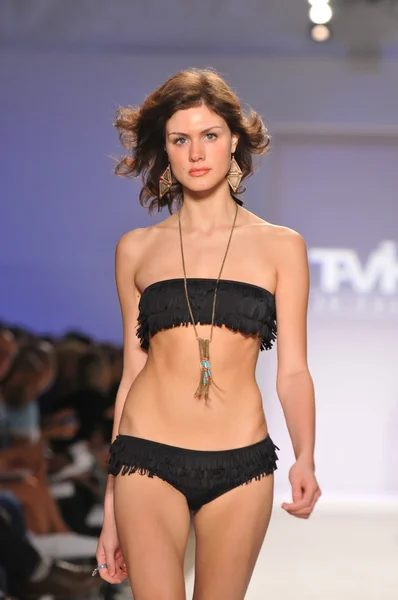MIAMI - JULY 18: Model walks runway at the Tavik Swimwear Collection for Spring, Summer 2012 during Mercedes-Benz Swim Fashion Week on July 18, 2011 in Miami, FL — Stock Photo, Image