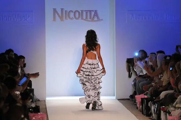 MIAMI - JULY 18: Model walks runway at the Nicolita Collection for Spring, Summer 2012 during Mercedes-Benz Swim Fashion Week on July 18, 2011 in Miami, FL — Stock Photo, Image