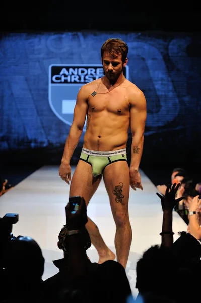 Los Angeles - March 12: A male model walks the runway at the Andrew Christian Fall Winter 2013 fashion show during Project Ethos Fashion event at club Avalon on March 12, 2013 in Los Angeles, CA — Stock Photo, Image