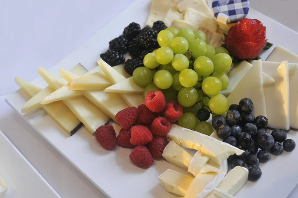 Different tasty snacks and cheese for wine — Stock Photo, Image