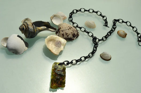 Decorative bracelets on matt surface with reflections Stock Photo